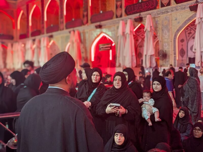 Karwane Habib pilgrims in prayer